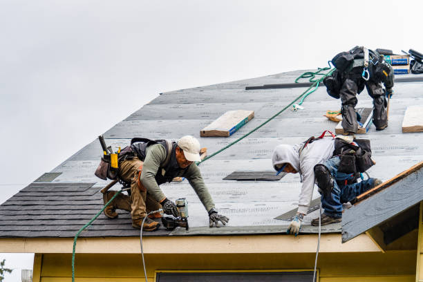 Professional Roofing technician working in Stowell, TX